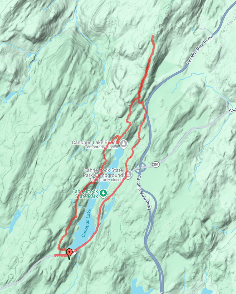 Hike route map at Fahnestock State Park — red trail looping around Canopus Lake