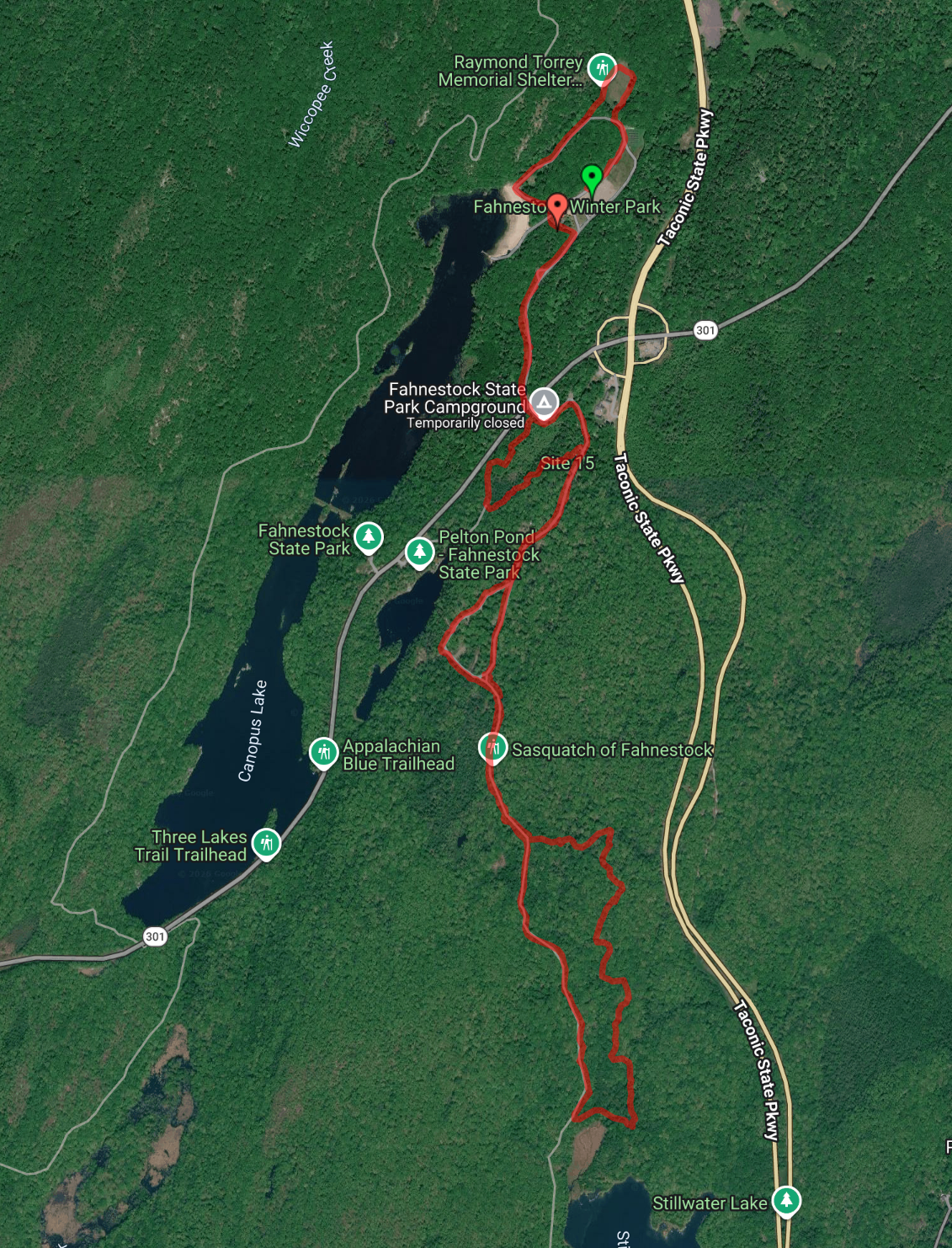 Cross-country ski route at Fahnestock State Park — red trail loop starting from Fahnestock Winter Park, running south past Pelton Pond and Canopus Lake