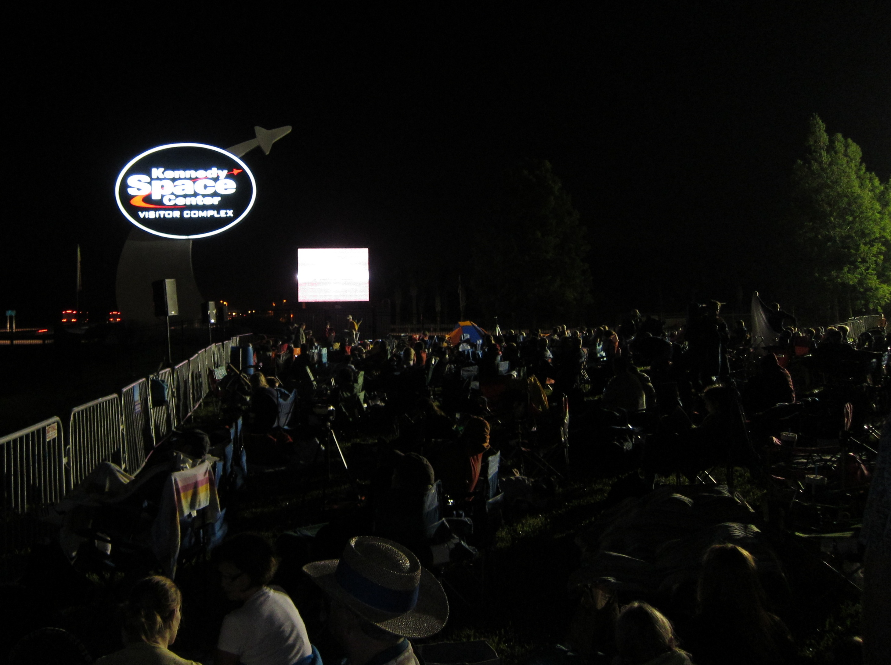 Crowd gathering at Kennedy Space Center before dawn
