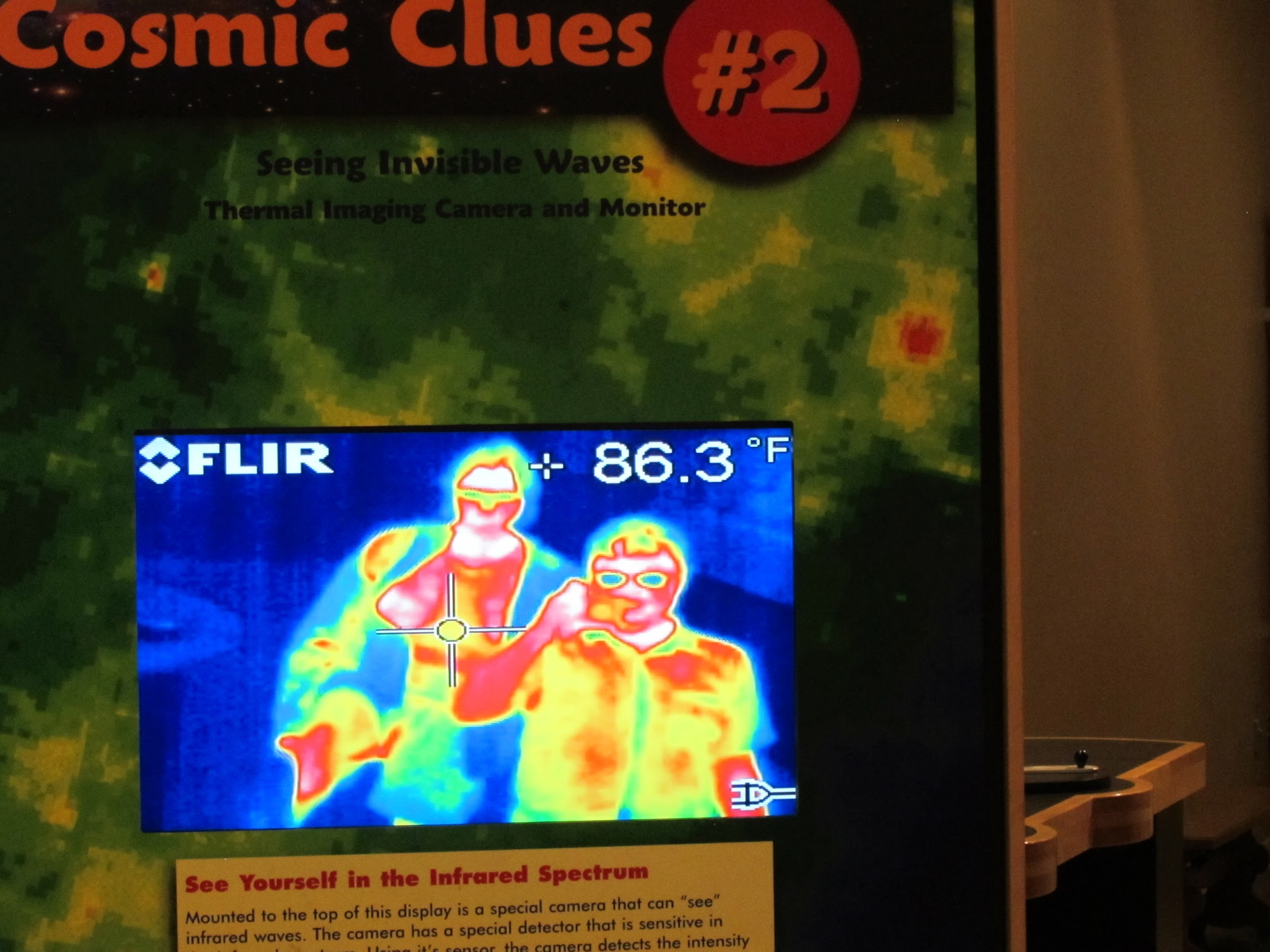 FLIR thermal image of Susan and Sean at the NRAO visitors center "See Yourself in the Infrared Spectrum" exhibit, reading 86.3°F — Susan's feet were notably cold