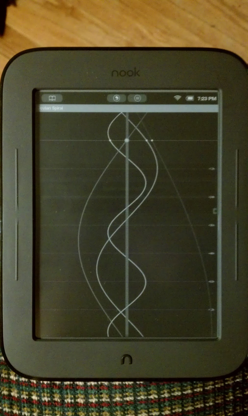 The "Where is Io" astronomy app running on a Nook Simple Touch, showing the Jovian Spiral screen