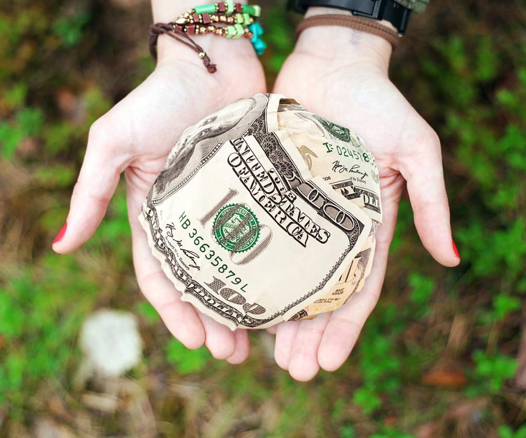 Image source: https://www.pexels.com/photo/cash-dollars-hands-money-271168/